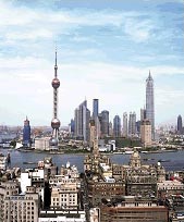 Towering over the Huangpu River, Shanghai is a 21st Century boomtown.